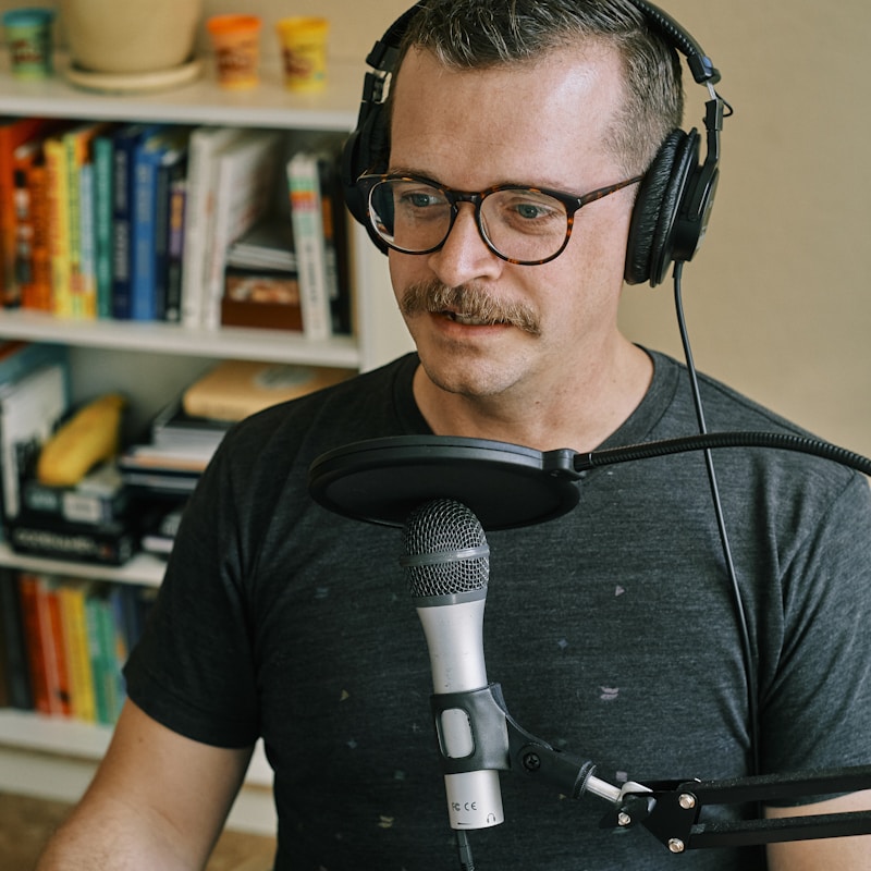 Creator in headphones listening during a recording session